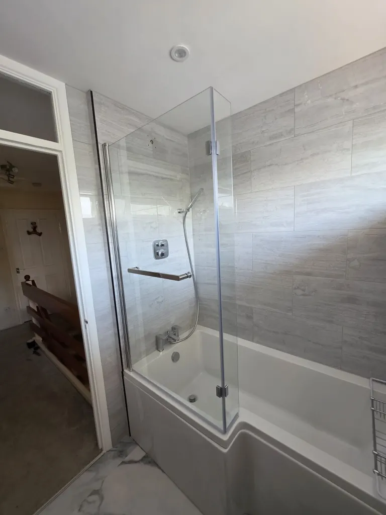 Grey-tiled family bathroom – Bathrooms