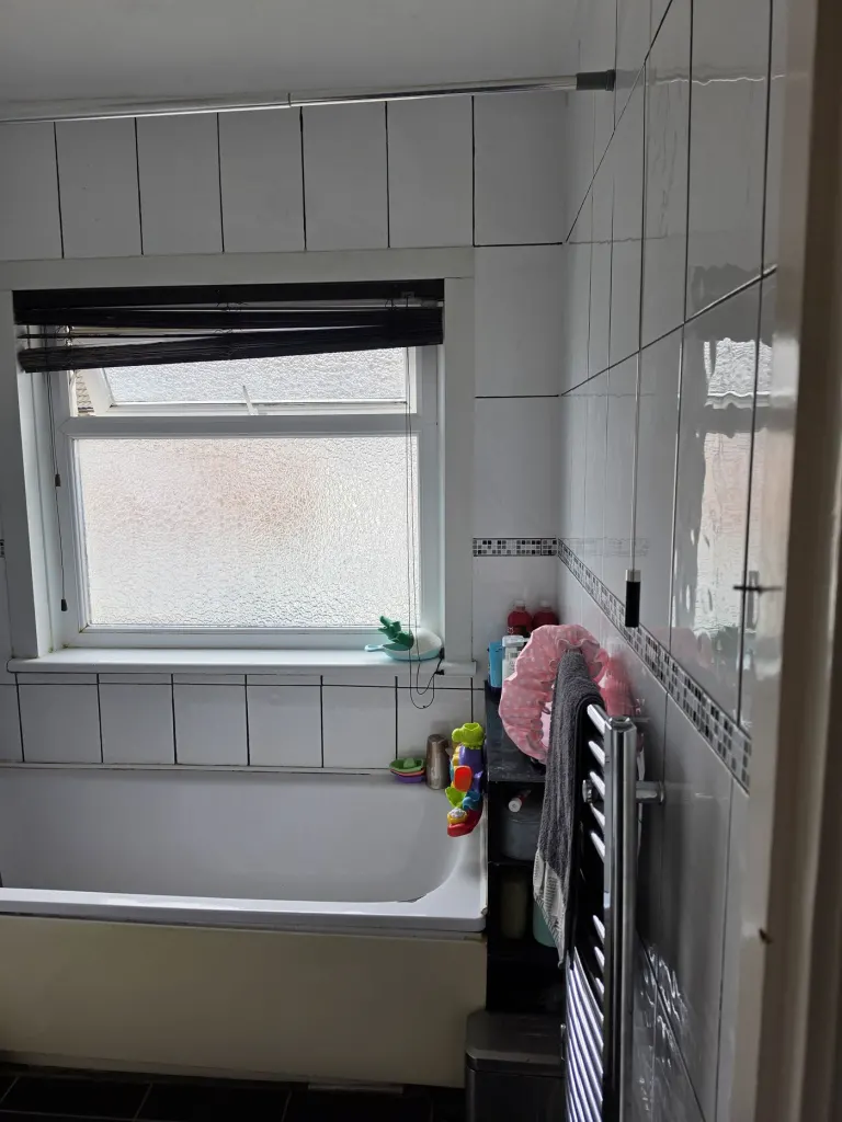 Before: Marble-effect bathroom renovation